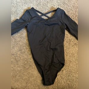 Girls medium black leotard and skirts